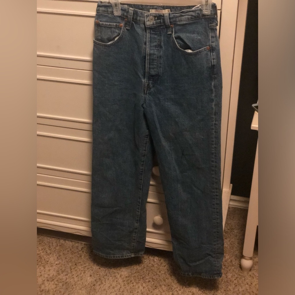 27 inch waist all around fits tight, 37 inch inseam, vintage Levi’s